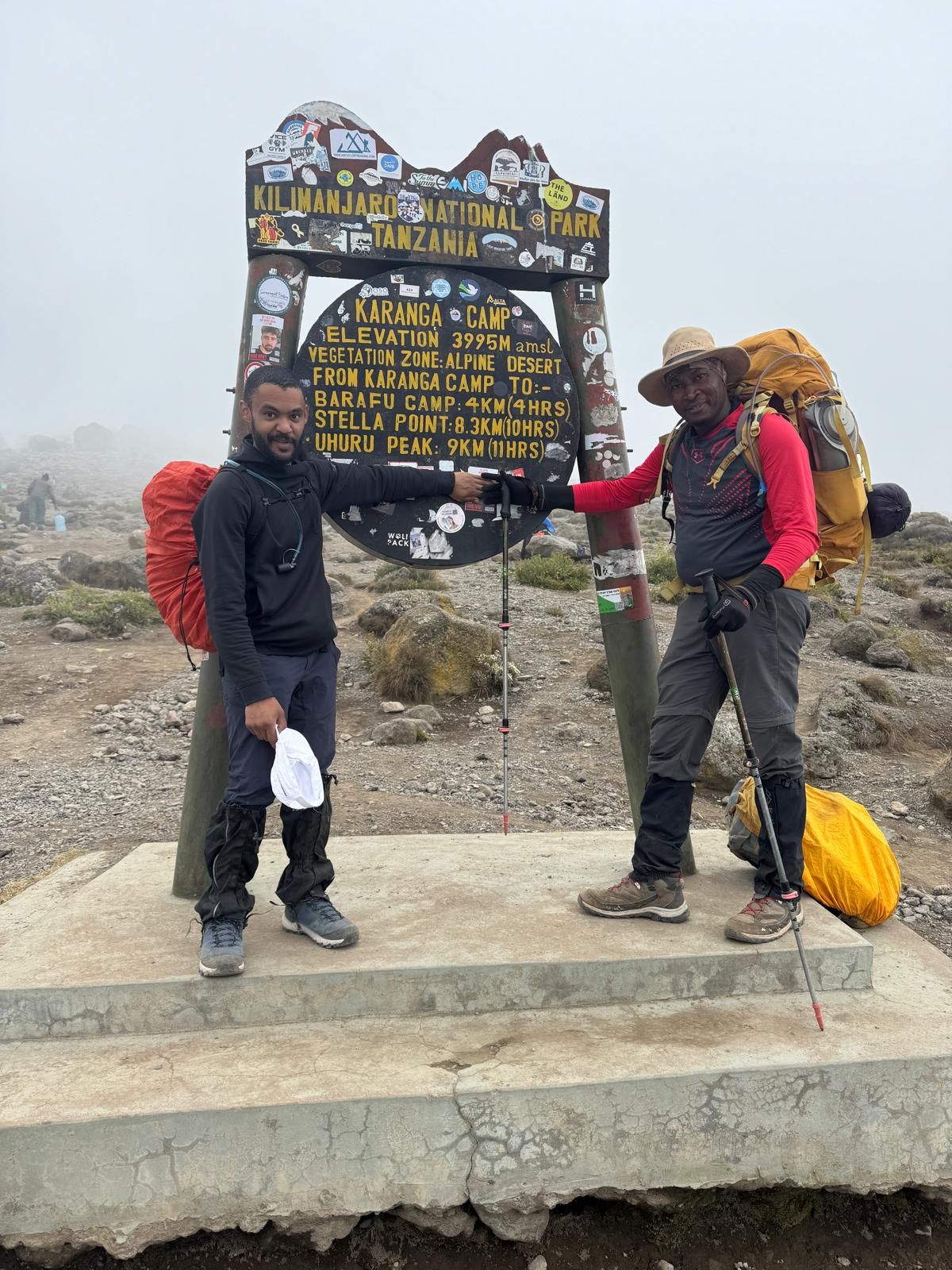 Ahmed with guide at Karanga Camp, 3,995m